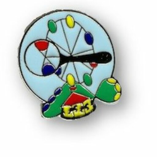 Lapel pin of THRILL Lab logo: magnifying glass looking at Ferris wheel with carousel and roller coaster below